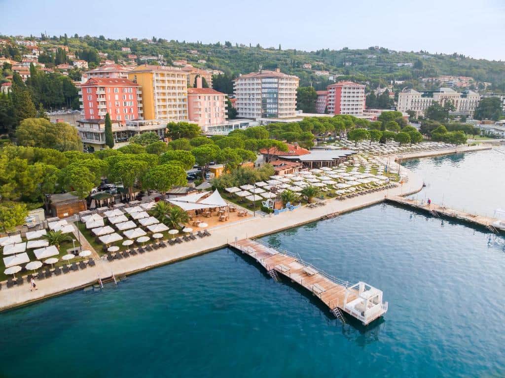 Hotel Slovenija – Terme & Wellness LifeClass modern spa resort façade with expansive pool and landscaped gardens