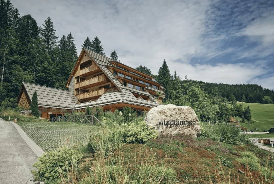 Scenic mountain-view suite at Vila Planinka, Slovenia’s award-winning alpine eco-luxury hotel in Jezersko valley