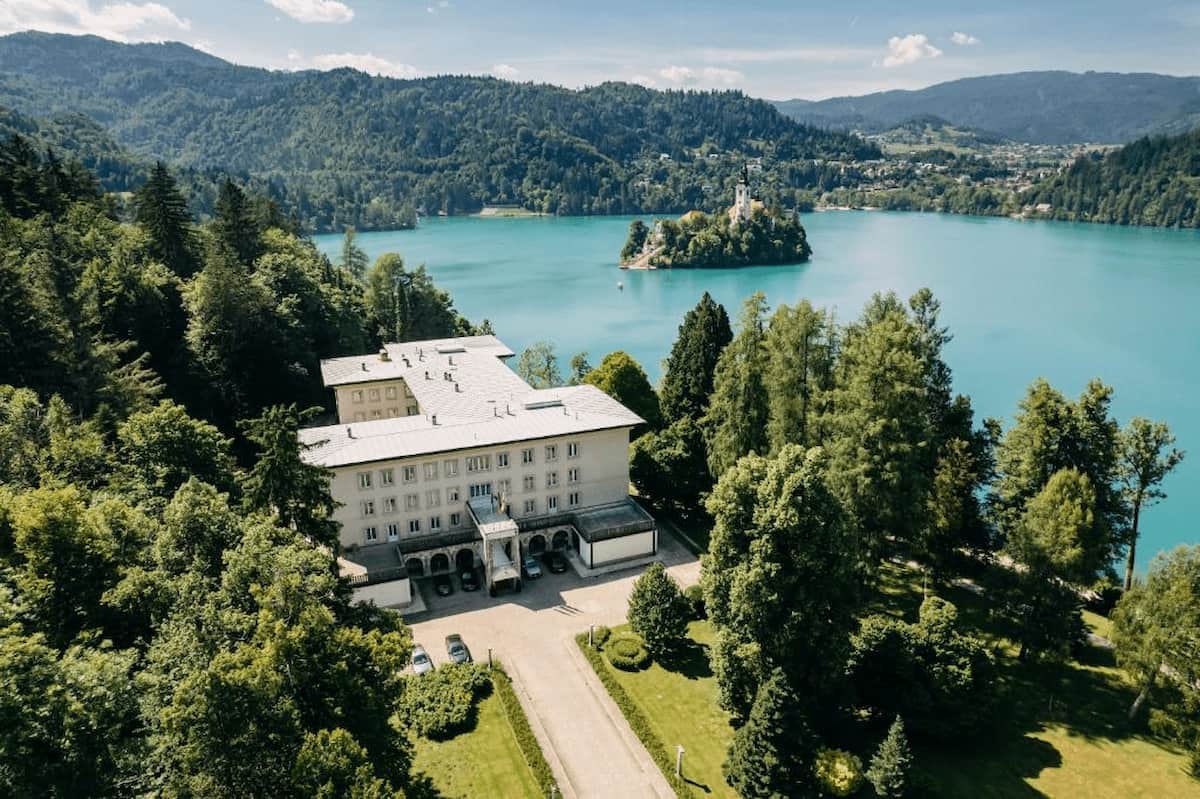 Vila Bled sunset terrace with champagne and vintage bathroom—Slovenia’s most exclusive hotel, honest 2025 review