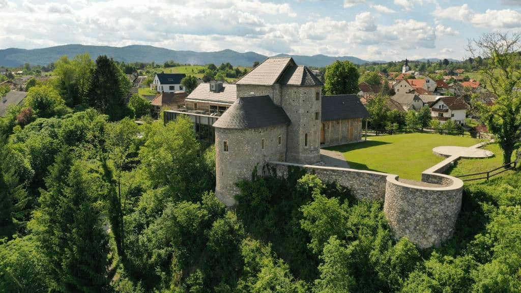 Private swimming pool and historic Vinica Castle surrounded by gardens – exclusive luxury retreat in Slovenia