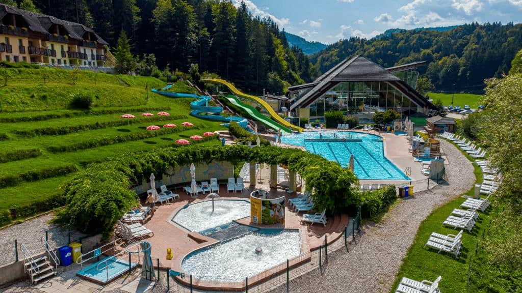 Eco luxury resorts Slovenia, terme snovik landscape and swiming pool view.