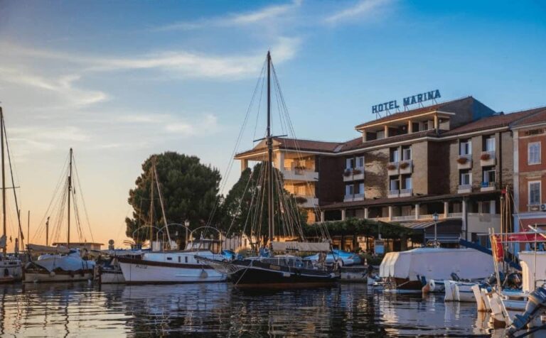 Best Hotels Izola Slovenia, sea view with hotel Marina and port.