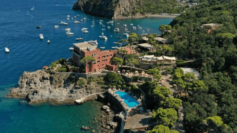 Best luxury beachfront hotels Italy. Stuning view of the coast and hotel Mezzatorre.