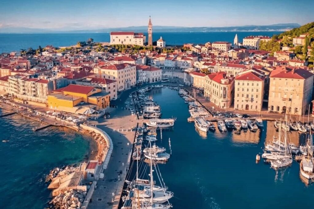 Portorož vs Piran Luxury Hotels. Spectacular view on Piran from the sea.