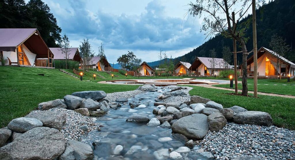 Luxury glamping Slovenia village with thermal spa.