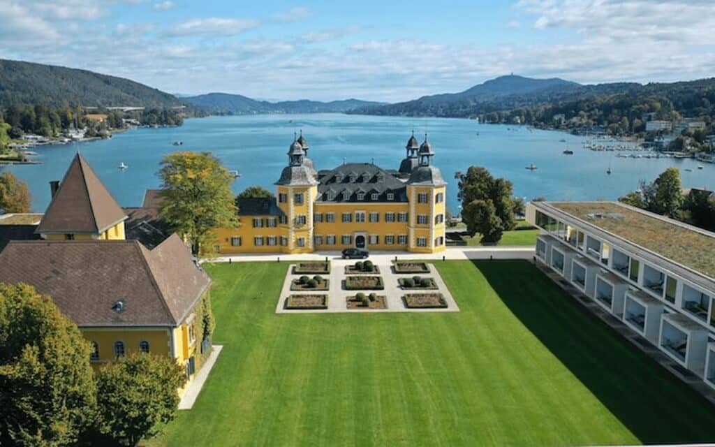 Luxury Hotels In Carinthia. Felkenstiner hotel view with the lake and landscape.