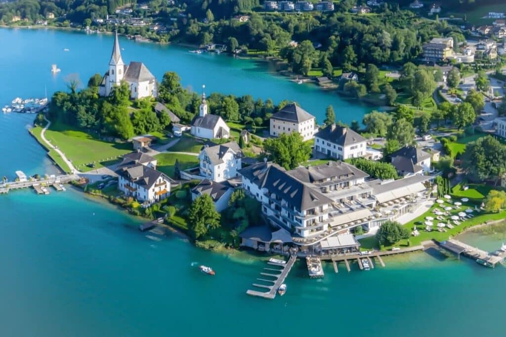 Best Lakefront Spa Hotels in Carinthia. Stunning view from above to the hotel and lake .