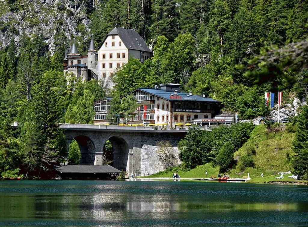 Best Luxury Castle-Hotels in Austria. Amazing view of the castle from the lake.