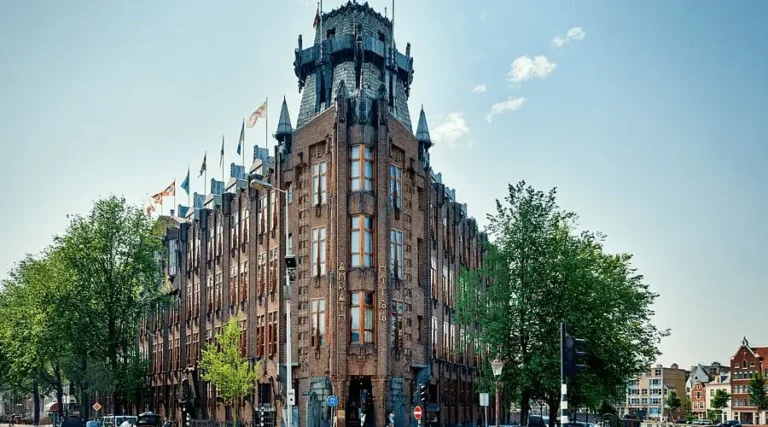 The Amsterdam School brickwork of the Grand Hotel Amrâth facade. One of the best hotels in Amsterdam.