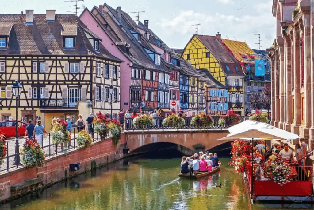 The historic Renaissance facades of the best hotels in Colmar at the river.