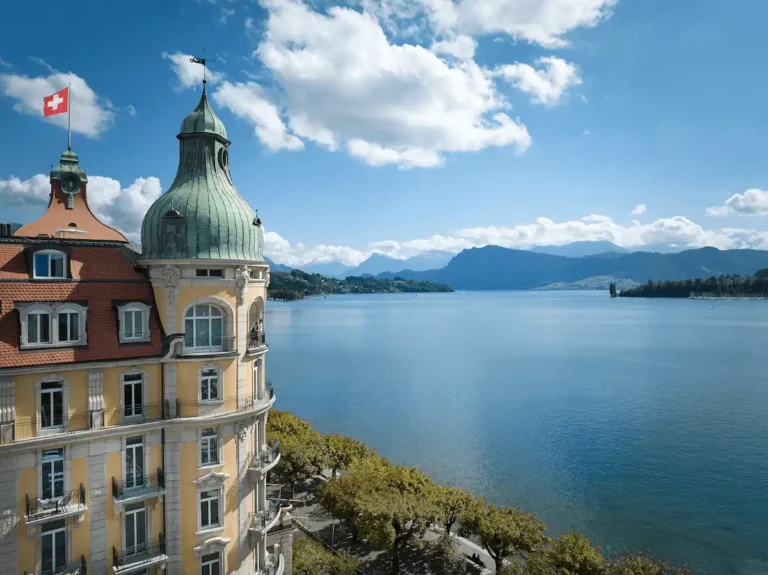 The landmark 1906 Belle Époque facade and iconic green copper domes of the Mandarin Oriental Palace, Luzern, a listed national heritage monument and one of the best hotels in Lucerne.