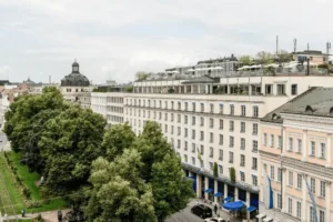 The legendary 19th-century facade of Hotel Bayerischer Hof on Promenadeplatz, a cornerstone of Bavarian hospitality and the best hotels in Munich.