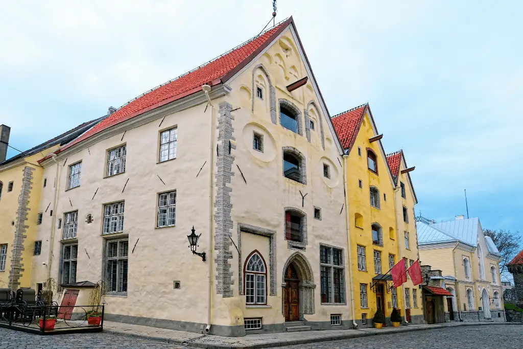 The Three Sisters is a centerpiece of the best hotels in Tallinn, featuring the 14th-century Gothic gables of the Big, Middle, and Small Sister houses and a 1651 carved oak portal.