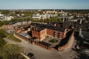 Audited for Best Hotels in Turku: The 1853 granite facade and red-brick architecture of Hotel Kakola, a historic former prison.