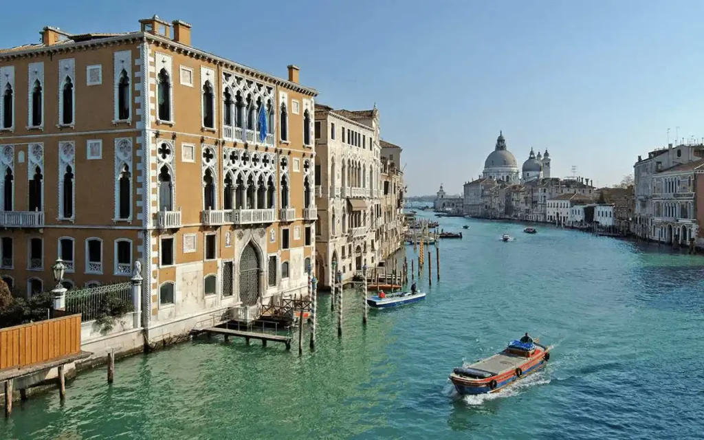 The 15th-century facade of The Gritti Palace, a former Doge residence and the premier heritage icon among the best hotels in Venice.