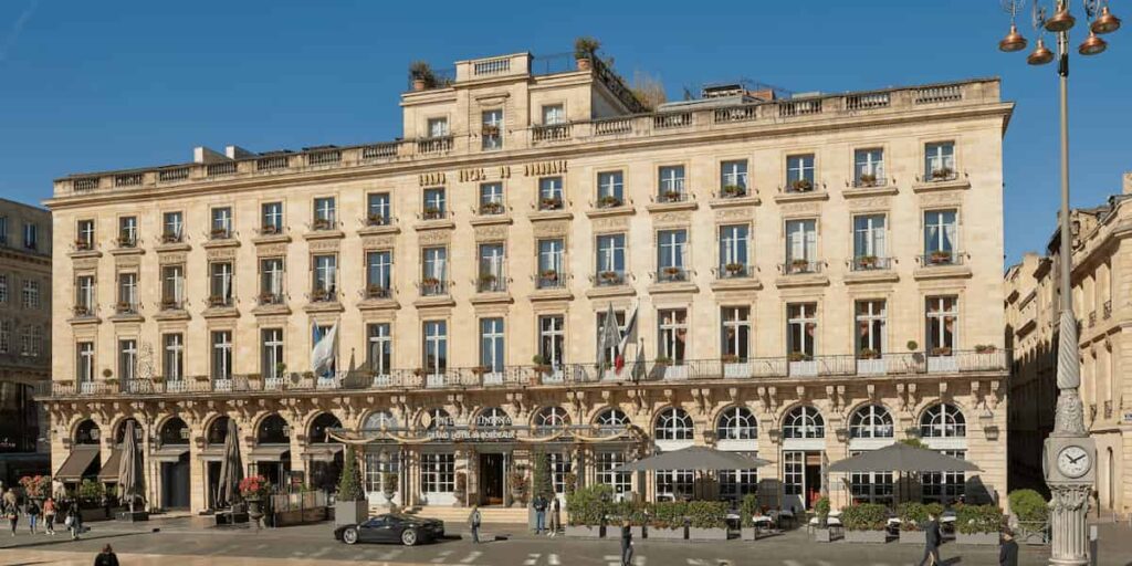 The 1789 neoclassical facade of the InterContinental Le Grand Hotel, one of the best hotels in Bordeaux for authentic heritage.