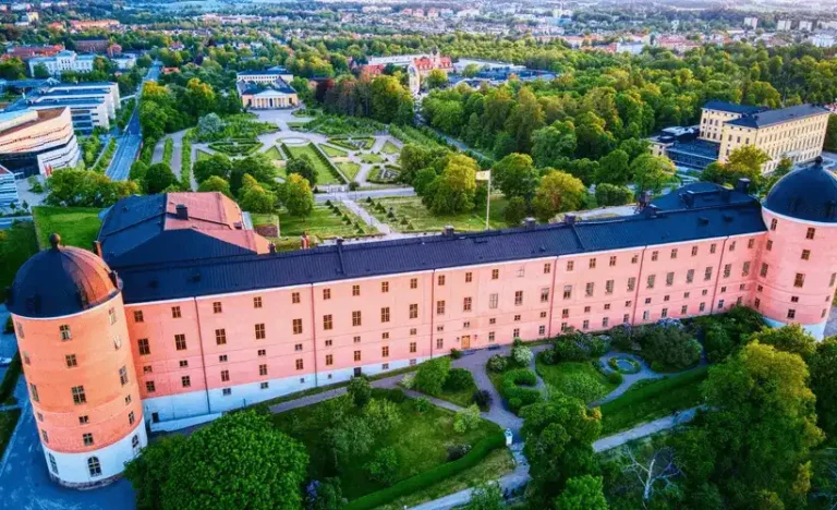 The 16th-century pink Renaissance facade of Uppsala Castle, the primary architectural anchor for the best hotels in Uppsala.