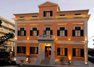 The 19th-century neoclassical facade of Bella Venezia, a former consulate and bank that is now one of the best hotels in Corfu town.
