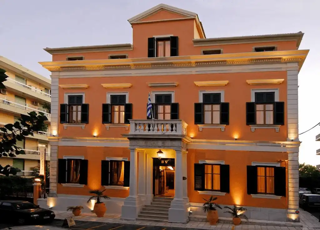 The 19th-century neoclassical facade of Bella Venezia, a former consulate and bank that is now one of the best hotels in Corfu town.