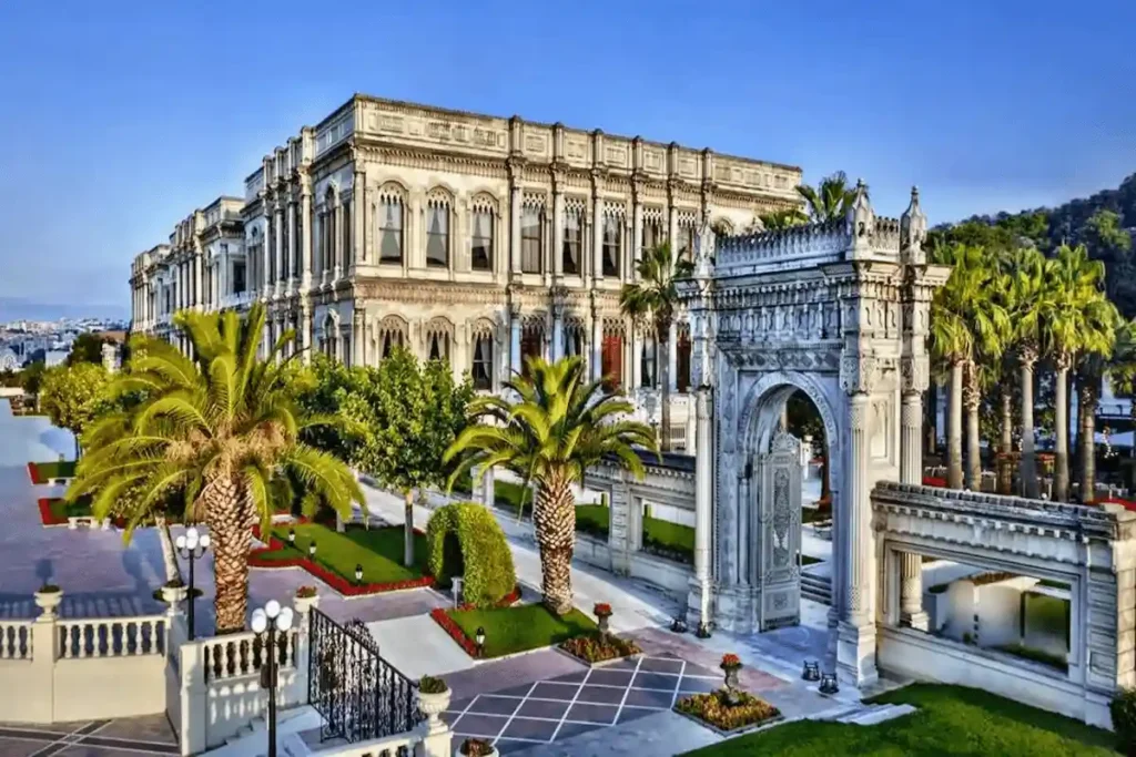 The 1867 imperial masonry facade and monumental marble water-gate of Çırağan Palace Kempinski Istanbul, a premier historical asset among the best hotels on Bosphorus Istanbul.
