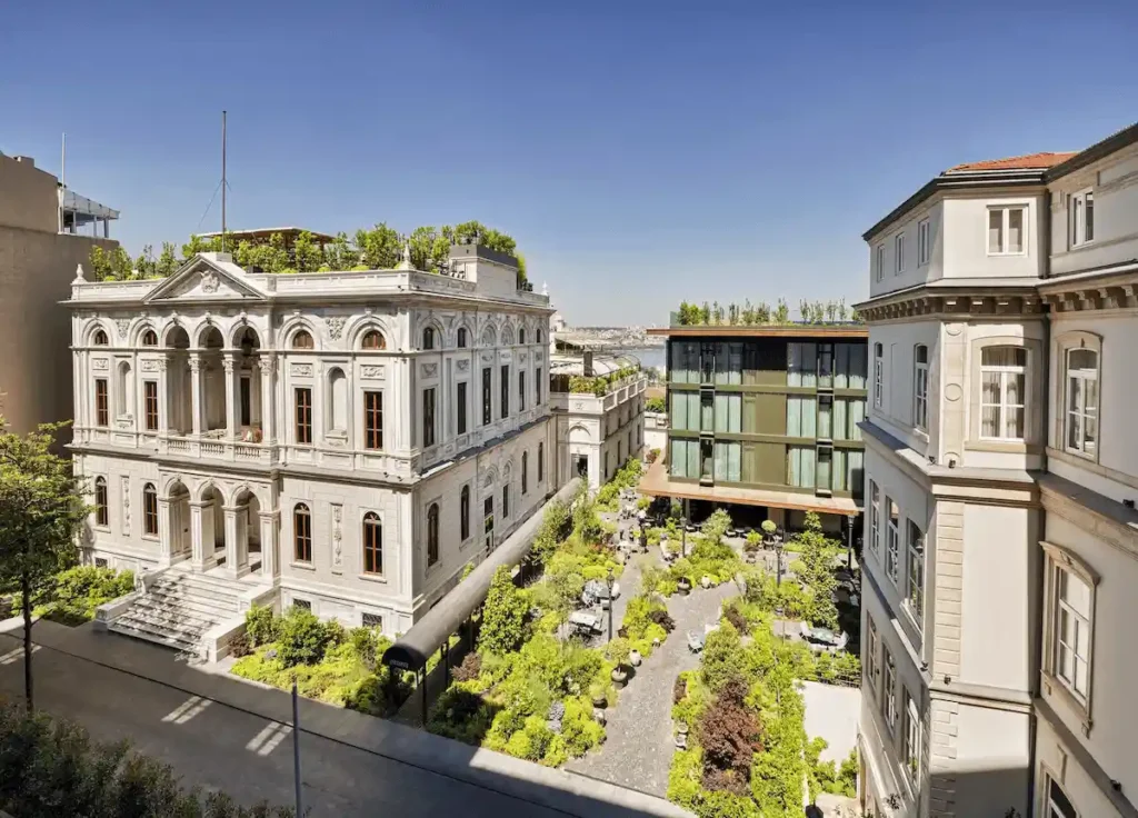 An exterior view of Soho House Istanbul, centered on the historic Palazzo Corpi, a 19th-century Genoese merchant’s mansion that served as the U.S. Embassy and Consulate before its conversion into a private members' club and luxury hotel in the Beyoğlu district.